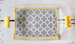 Pick any two fat quarters and some scrap batting and you will have yourself a large hot pad for your casserole dish. This project takes an hour or less. Tutorial by AuntieEmsCrafts.com