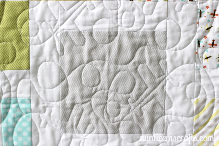 Custom airplane quilting by Quilting Together With Mindy. Perfect on the Oh Boy Baby Quilt by AuntieEmsCrafts.com