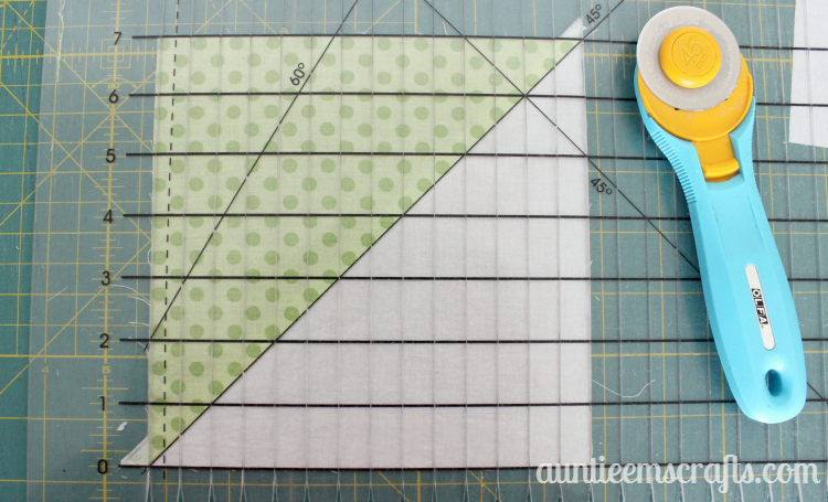 Rainbow Half Square Triangle Quilt. This rainbow HST (half square triangle) quilt came together in just one day.  You, too, can make one quickly with scraps or even a layer cake.| Auntie Em's Crafts