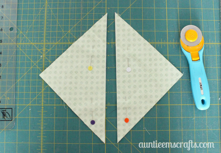 Rainbow Half Square Triangle Quilt. This rainbow HST (half square triangle) quilt came together in just one day.  You, too, can make one quickly with scraps or even a layer cake.| Auntie Em's Crafts